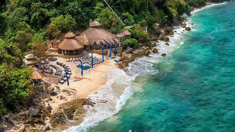 Bali beach clubs: Karma beach sits in a beautiful cove in Ungasan